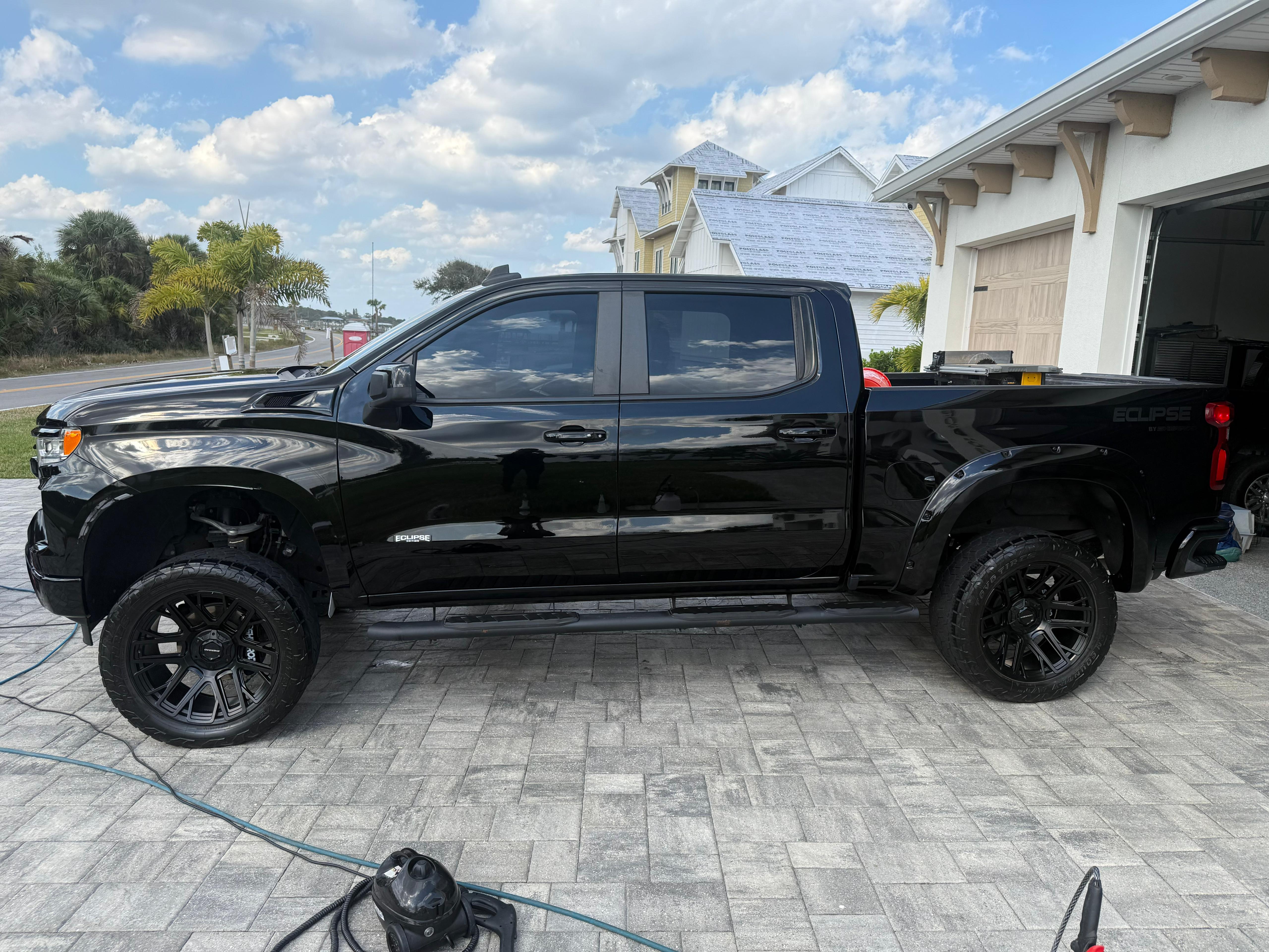Black Chevrolet truck full exterior detail residential